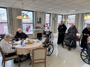 people sitting and standing together